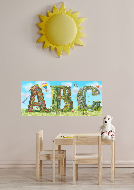 ABC print on the wall in a playroom, with a yellow sun, table and chairs.